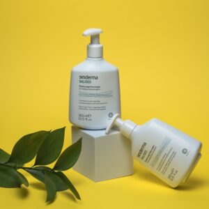 Sesderma Foamy Cream Soap displayed with modern design on bold yellow backdrop.